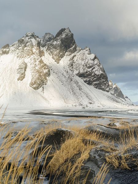 Coastal landscape with dunes at iconic Stokksnes during winter and stormy conditions Iceland